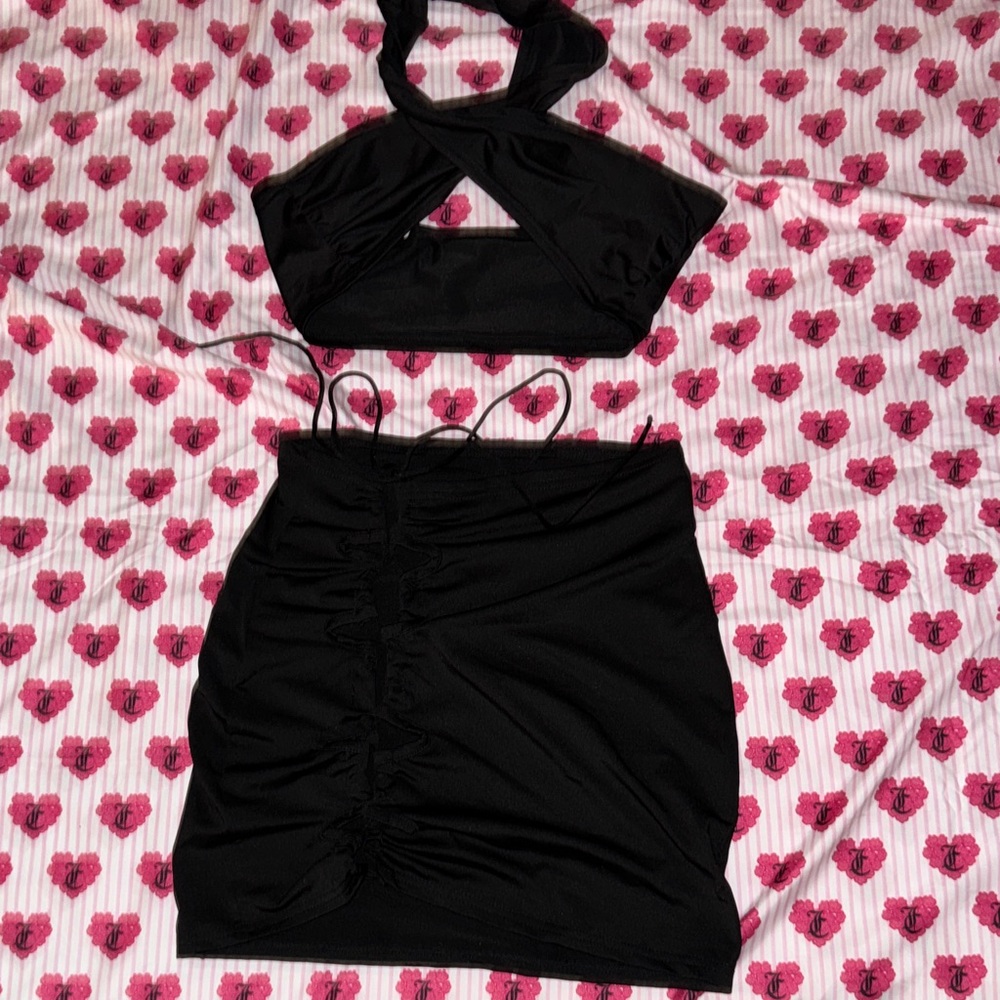 Black tie up in the front and twist top set